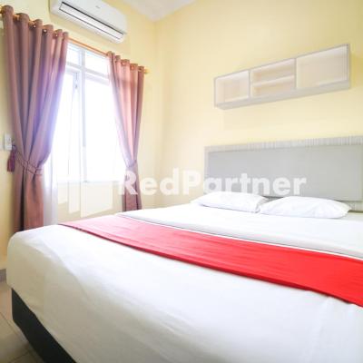 Indah Residence Syariah Mitra RedDoorz (1, Jalan Siak, RT 01, RW 07, Suka Pura 14250 Jakarta)